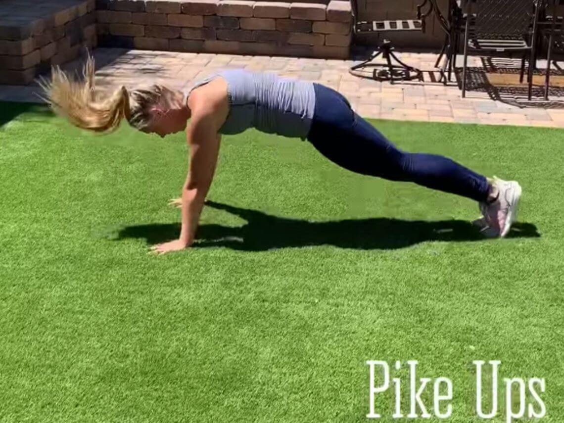 Female wellstyles instructor doing a workout in her backyard