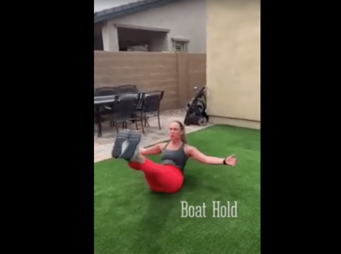 A wellstyles instructor is working out in her backyard